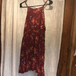 Red floral dress with a ruffled hem.